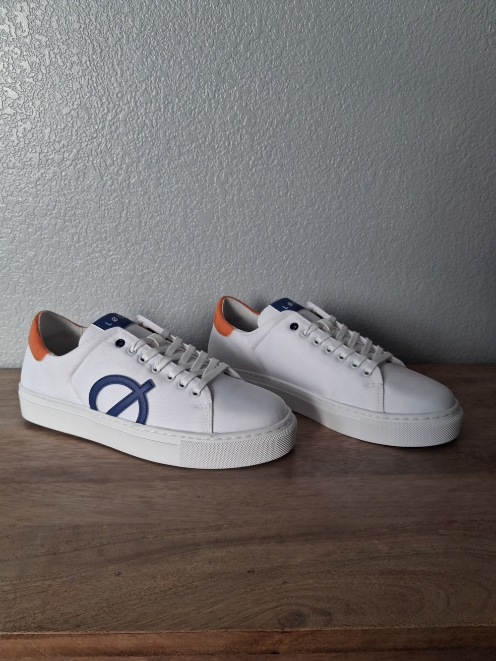 Loci White Low-Top Sneakers with Blue Heel Tab and Orange Accent. No Box
